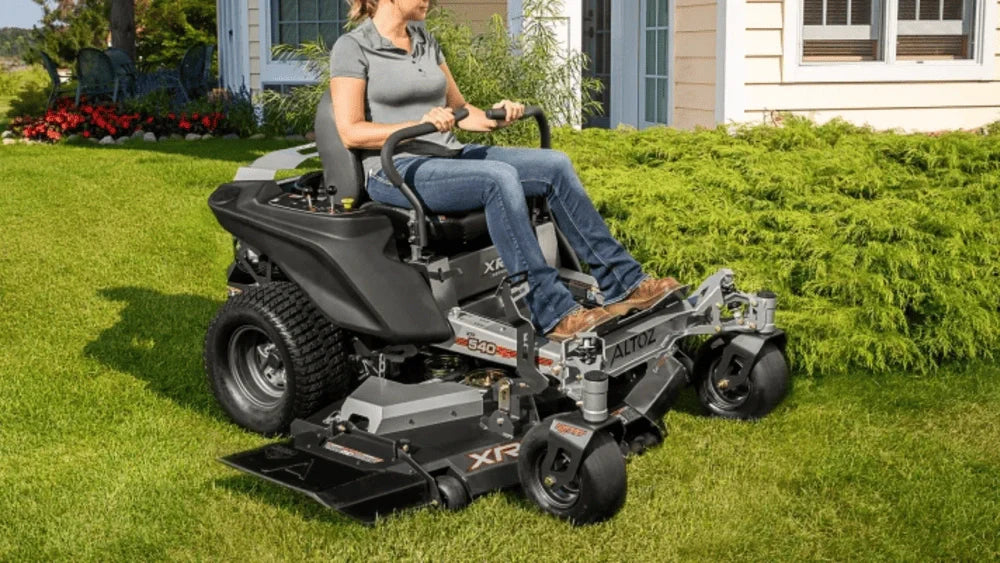 Altoz zero turn mower positioned on a sloped lawn, ideal for hills and uneven terrain in Somerset, KY.